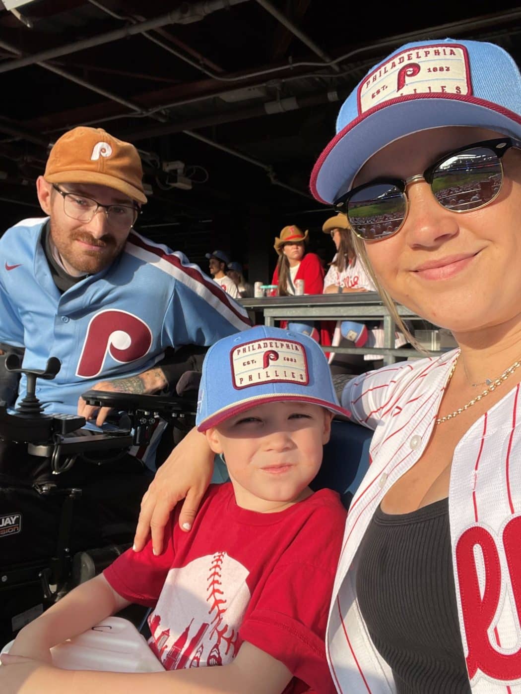 Family photo at a baseball game.