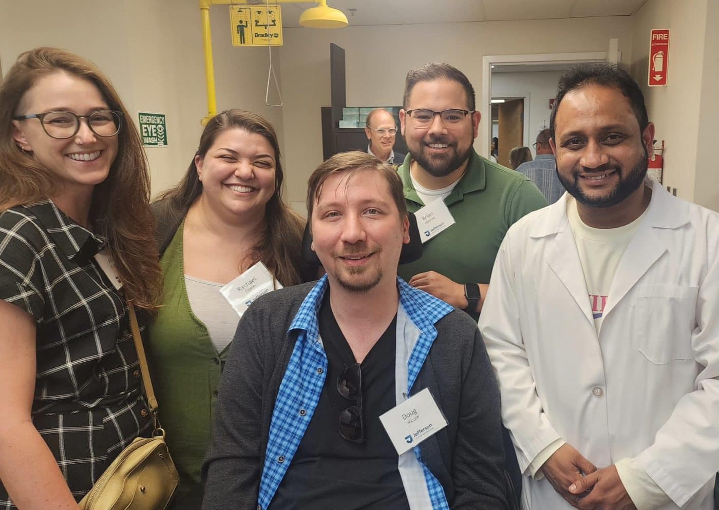 Photo from Jefferson Clinic Open House featuring people with ALS and clinicians.