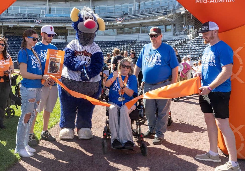 Participants cut ribbon at Scranton Walk.
