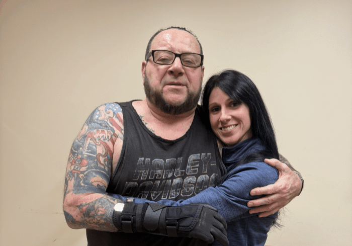 Dr. Altiero pauses for a photo with one of her patients.